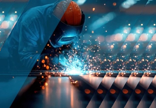 Welder at work with sparks flying